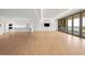 Open concept living room with kitchen and ocean views at 1561 Gulf Of Mexico Dr # 403, Longboat Key, FL 34228