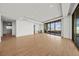 Open living space with access to balcony and wet bar at 1591 Gulf Of Mexico Dr # 413, Longboat Key, FL 34228