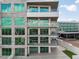 Luxury condo building with balconies offering water views at 1591 Gulf Of Mexico Dr # 413, Longboat Key, FL 34228
