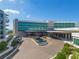 Luxury hotel with modern architecture and a large porte-cochère at 1591 Gulf Of Mexico Dr # 413, Longboat Key, FL 34228