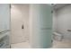 Modern bathroom with a walk-in shower and a toilet at 1591 Gulf Of Mexico Dr # 413, Longboat Key, FL 34228