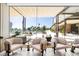 Relaxing lounge with comfortable seating and beautiful views of the ocean and grounds at 1591 Gulf Of Mexico Drive # 311, Longboat Key, FL 34228