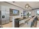 Well-equipped community kitchen with breakfast bar and modern finishes at 16247 Hidden Oak Loop, Bradenton, FL 34211