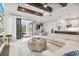Open living space with sliding doors leading to outdoor patio at 16247 Hidden Oak Loop, Bradenton, FL 34211
