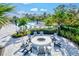 Community fire pit with seating for gatherings at 16247 Hidden Oak Loop, Bradenton, FL 34211