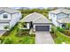 Stunning curb appeal with a well manicured lawn at 16247 Hidden Oak Loop, Bradenton, FL 34211