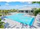 Resort-style pool with lounge chairs and a clubhouse at 16247 Hidden Oak Loop, Bradenton, FL 34211