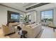 Community room with comfortable seating and a large screen TV at 16247 Hidden Oak Loop, Bradenton, FL 34211