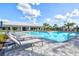 Relaxing pool area with plenty of lounge chairs at 16247 Hidden Oak Loop, Bradenton, FL 34211