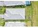 Top-down view of a house roof and yard at 16247 Hidden Oak Loop, Bradenton, FL 34211