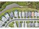 Aerial view of neighborhood with canal at 16247 Hidden Oak Loop, Bradenton, FL 34211