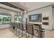 Modern community kitchen featuring a breakfast bar and stainless steel appliances at 16247 Hidden Oak Loop, Bradenton, FL 34211