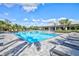 Inviting pool and patio area with comfortable seating at 16247 Hidden Oak Loop, Bradenton, FL 34211