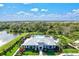 Resort-style pool with clubhouse and landscaping at 16247 Hidden Oak Loop, Bradenton, FL 34211