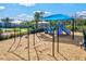 Community playground with swings and slides at 16247 Hidden Oak Loop, Bradenton, FL 34211