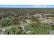 Aerial view showing home's location in a quiet neighborhood at 1800 S San Mateo Dr, North Port, FL 34288