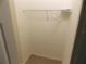 Simple closet with wire shelving and a single clothes rod at 20283 Lagente Cir, Venice, FL 34293