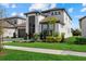 Two-story house with a dark brown garage door and white exterior at 3512 Hidden Creek Blvd, Sarasota, FL 34240