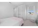 Bright bedroom with a double bed and large closet at 3512 Hidden Creek Blvd, Sarasota, FL 34240