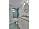 Bathroom featuring a shower/tub combo, vanity with decorative accents, and a large mirror at 3660 Ironwood Cir # 101M, Bradenton, FL 34209