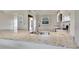 Modern kitchen with stainless steel appliances, granite countertops, and ample natural light at 3660 Ironwood Cir # 101M, Bradenton, FL 34209