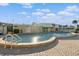 Enjoy the refreshing pool with surrounding patio at 3880 Ironwood Ln # 208E, Bradenton, FL 34209