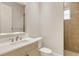 Small bathroom with a walk-in shower, toilet and single sink vanity at 4008 Founders Club Dr, Sarasota, FL 34240