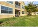 Ground floor condo with private screened patio and lush landscaping at 4239 Expedition Way, Osprey, FL 34229