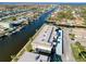 Aerial view of condo building offering waterfront access and canal views at 4452 Garnet Dr # 205, New Port Richey, FL 34652