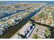 Aerial view of waterfront community with canal access and many homes at 4452 Garnet Dr # 205, New Port Richey, FL 34652