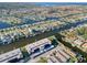 Aerial view of condo building showcasing waterfront location and boat access at 4452 Garnet Dr # 205, New Port Richey, FL 34652