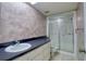 Bathroom with a shower/tub combo, vanity, and tile floor at 4452 Garnet Dr # 205, New Port Richey, FL 34652