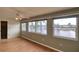 Bright bedroom with water views, laminate wood floor, and a spacious closet at 4452 Garnet Dr # 205, New Port Richey, FL 34652