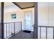 Condo entry with tiled floor and view into kitchen at 4452 Garnet Dr # 205, New Port Richey, FL 34652