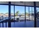View from covered walkway showing parking and surrounding buildings at 4452 Garnet Dr # 205, New Port Richey, FL 34652
