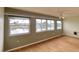 Living room with water views and wood flooring at 4452 Garnet Dr # 205, New Port Richey, FL 34652