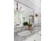 Elegant bathroom with marble finishes and double sinks at 4511 Bay Shore Rd, Sarasota, FL 34234