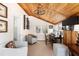 Charming home office with wood paneled ceiling and built-in shelving at 4511 Bay Shore Rd, Sarasota, FL 34234
