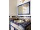 Charming bathroom with blue and white patterned tile and a unique sink at 4511 Bay Shore Rd, Sarasota, FL 34234