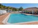 Refreshing community pool with plenty of lounge chairs for relaxation at 4517 Streamside Ct # 1905, Sarasota, FL 34238