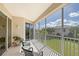 Spacious screened balcony overlooks lush green landscape at 4517 Streamside Ct # 1905, Sarasota, FL 34238
