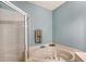 Bathroom features corner bathtub and separate shower at 4517 Streamside Ct # 1905, Sarasota, FL 34238