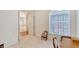 Home office with a window, chair and access to upstairs hallway at 4517 Streamside Ct # 1905, Sarasota, FL 34238