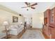 Spacious Gathering room with hardwood floors, a ceiling fan, and large windows at 4517 Streamside Ct # 1905, Sarasota, FL 34238