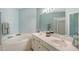 Double vanity bathroom with a corner tub and shower at 4517 Streamside Ct # 1905, Sarasota, FL 34238