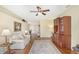 Relaxing Gathering room with hardwood floors, a ceiling fan, and built-in cabinetry at 4517 Streamside Ct # 1905, Sarasota, FL 34238