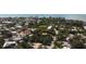 Aerial view of neighborhood near the coast, showcasing various homes at 4925 Primrose Path, Sarasota, FL 34242