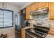 Well-equipped kitchen featuring stainless steel appliances at 5230 Lake Village Dr # 66, Sarasota, FL 34235