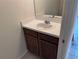 Small bathroom with single sink vanity and mirror at 5723 New Paris Way, Ellenton, FL 34222