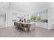 Modern kitchen with large island and stainless steel appliances at 5910 Gulf Of Mexico Dr, Longboat Key, FL 34228
